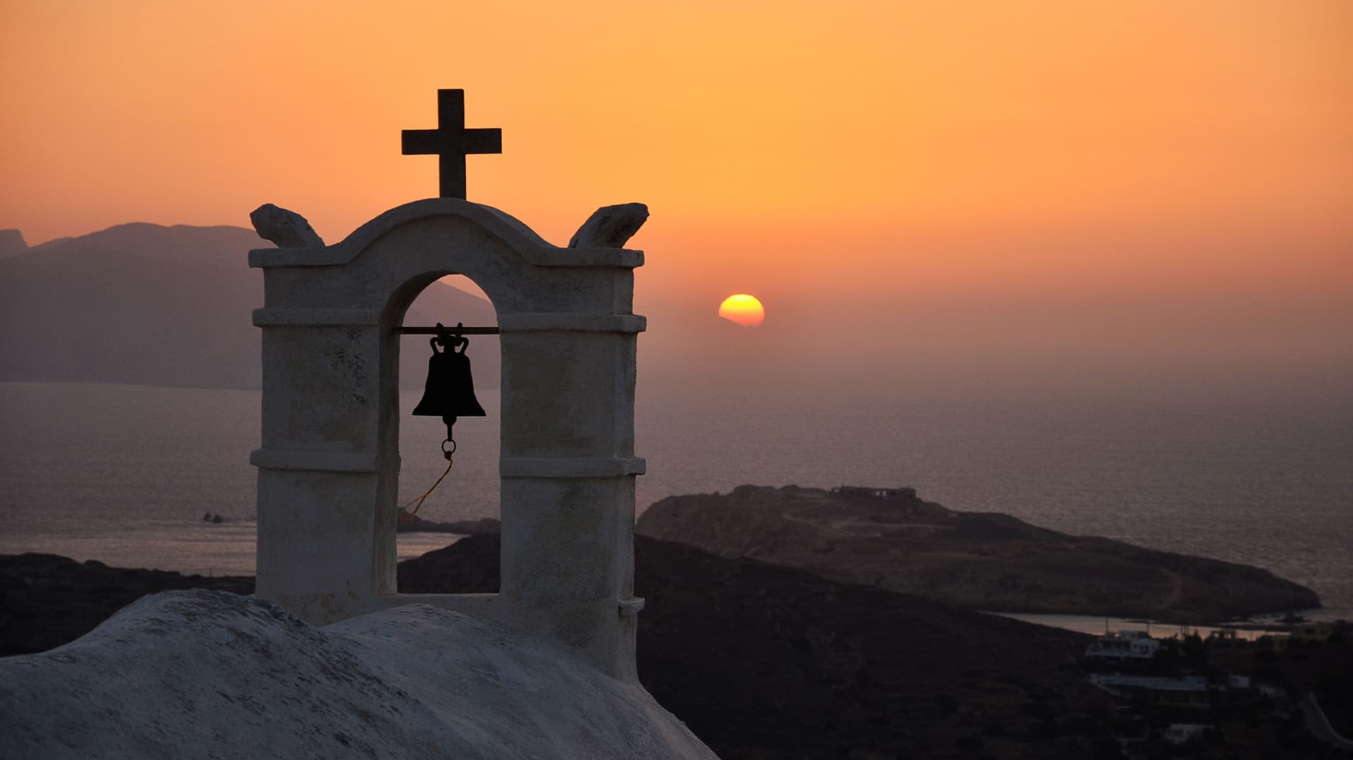 Greek Island Hopping: Paros, Ios & Santorini Sunsets