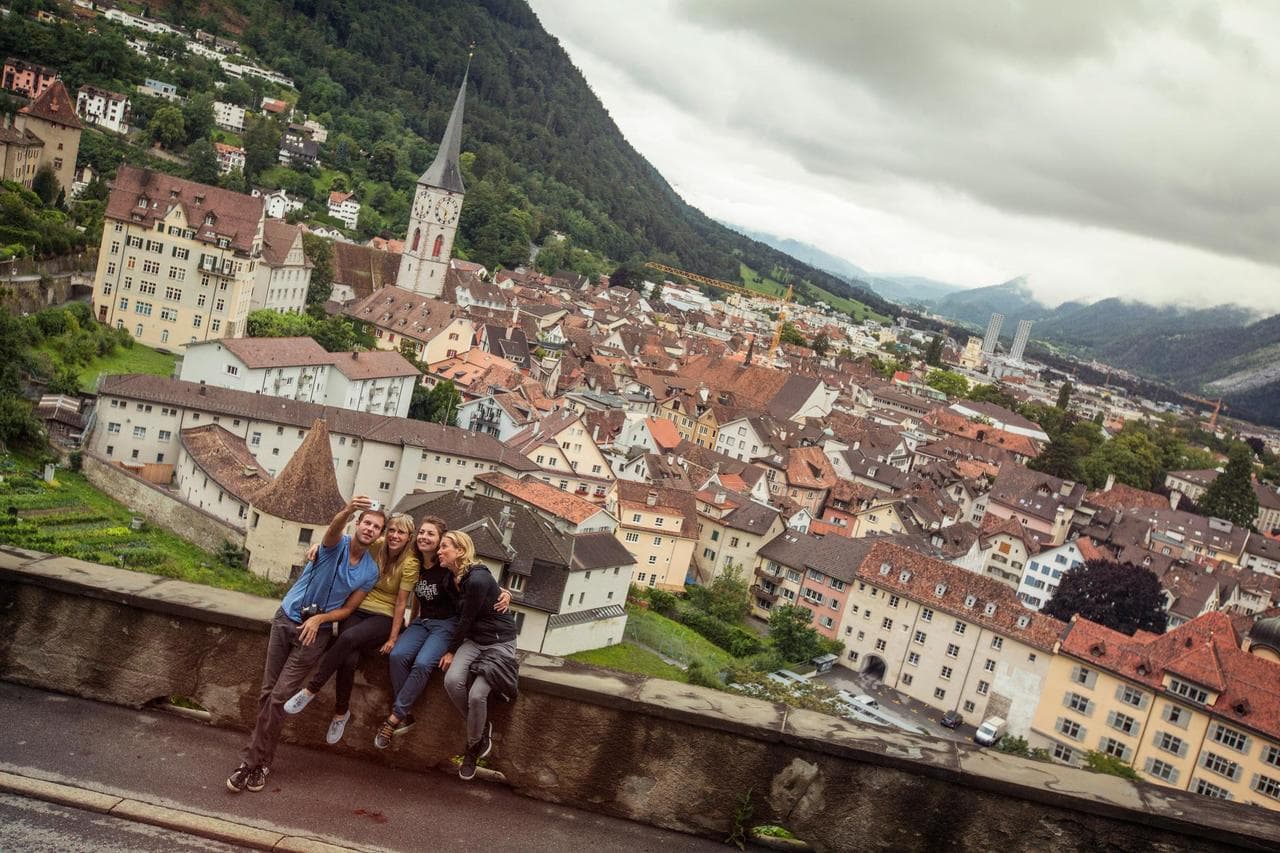 Panoramic views of Swiss valleys, waterfalls, and villages